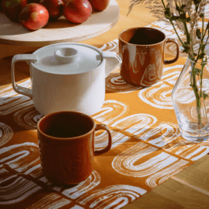 Table setting with textile print designed by Saara Obele