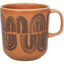 Ceramic mug with graphic pattern design by Saara Obele